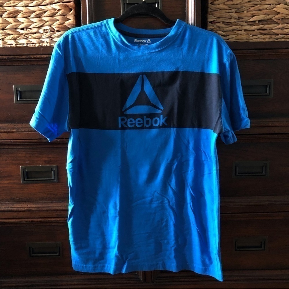 Reebok  blue spell out logo short sleeve graphic tee in size S